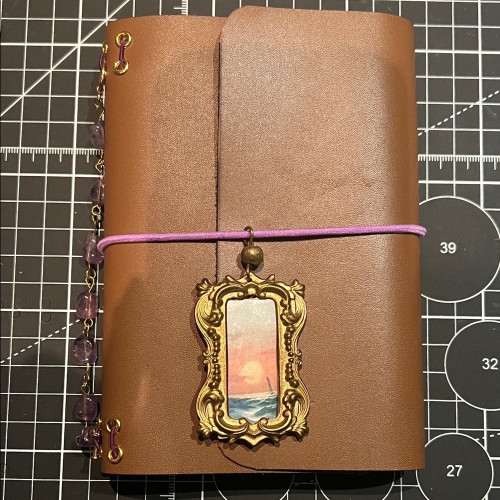 Brown Leather trifold travellers Journal with Gold Pendant